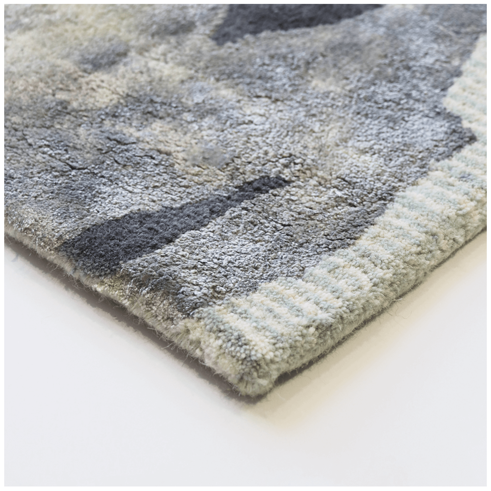 Tapis contemporain tufté à la main en laine et viscose, motif inspiré de l'océan, pour salon