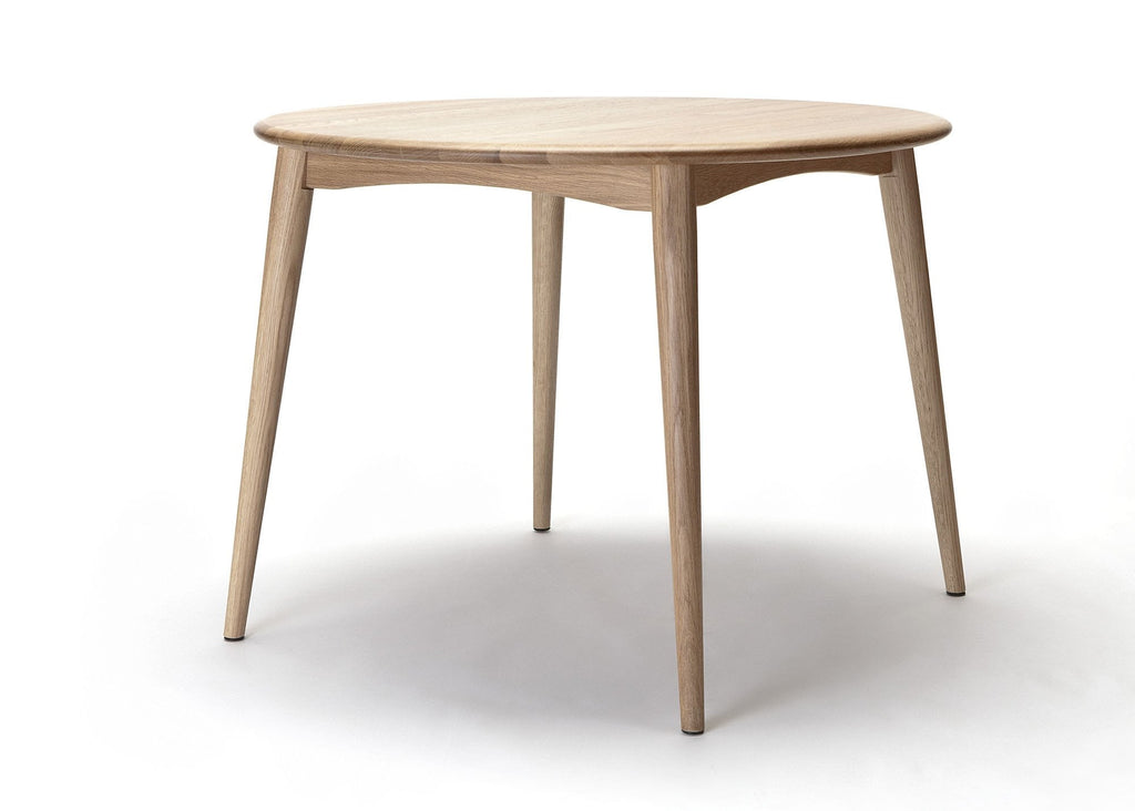 Table à manger ronde en chêne américain massif d'inspiration japonaise avec piètement arqué pour salle à manger