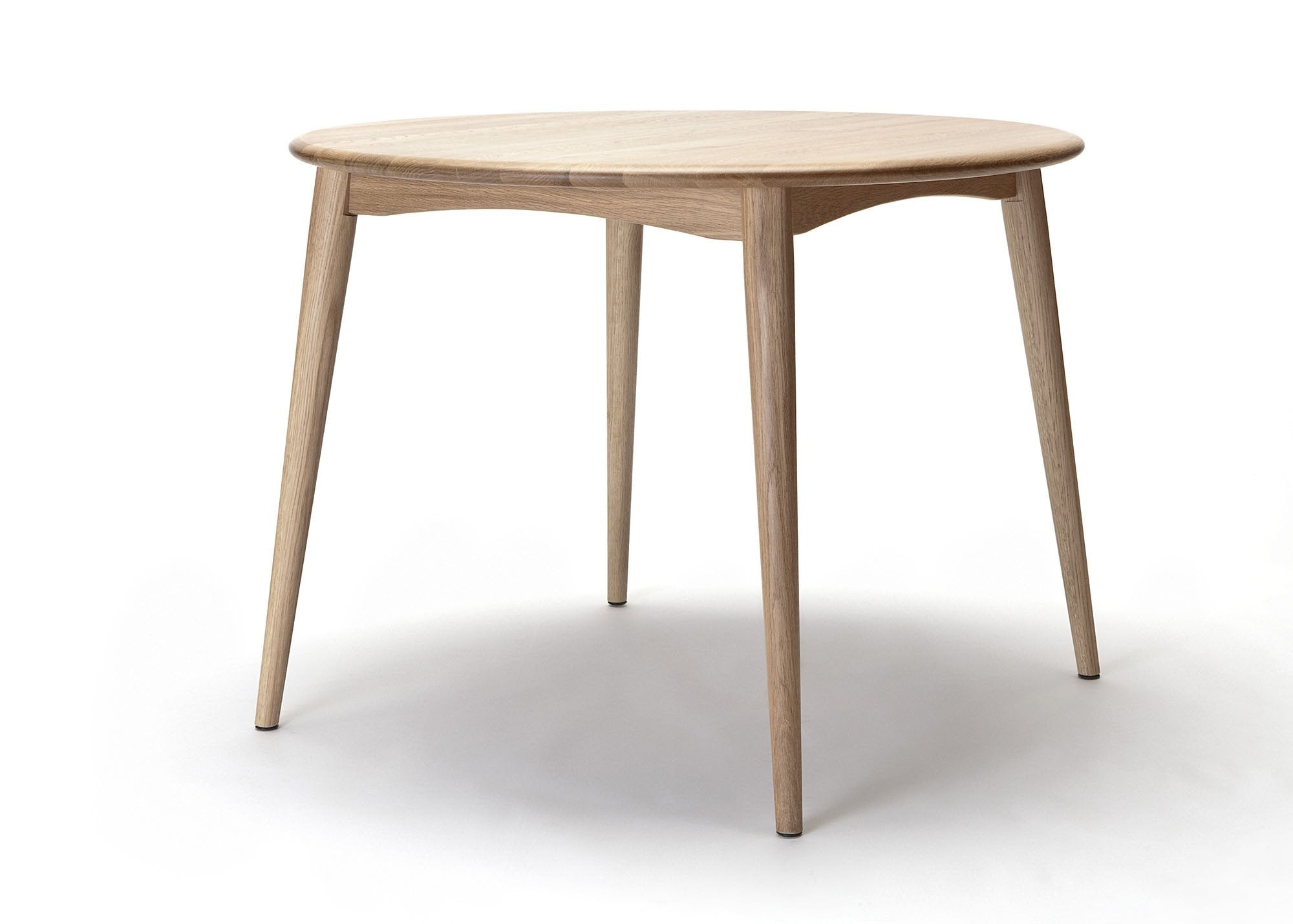 Table à manger ronde en chêne américain massif d'inspiration japonaise avec piètement arqué pour salle à manger